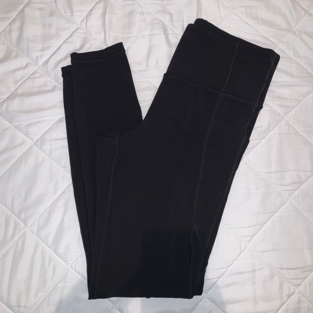 Athleta Stash Pocket Salutation Tight